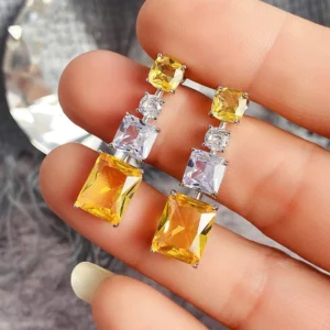 American Diamond Studded Yellow Geometrical Crushed Ice Cut Drop Earrings