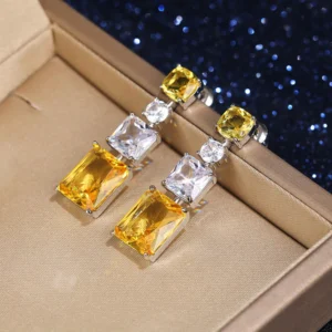 American Diamond Studded Yellow Geometrical Crushed Ice Cut Drop Earrings